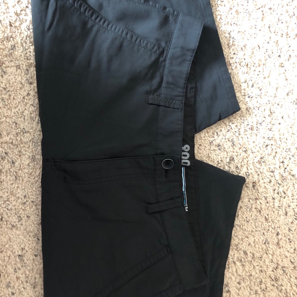 Black Tony Hawk shorts.